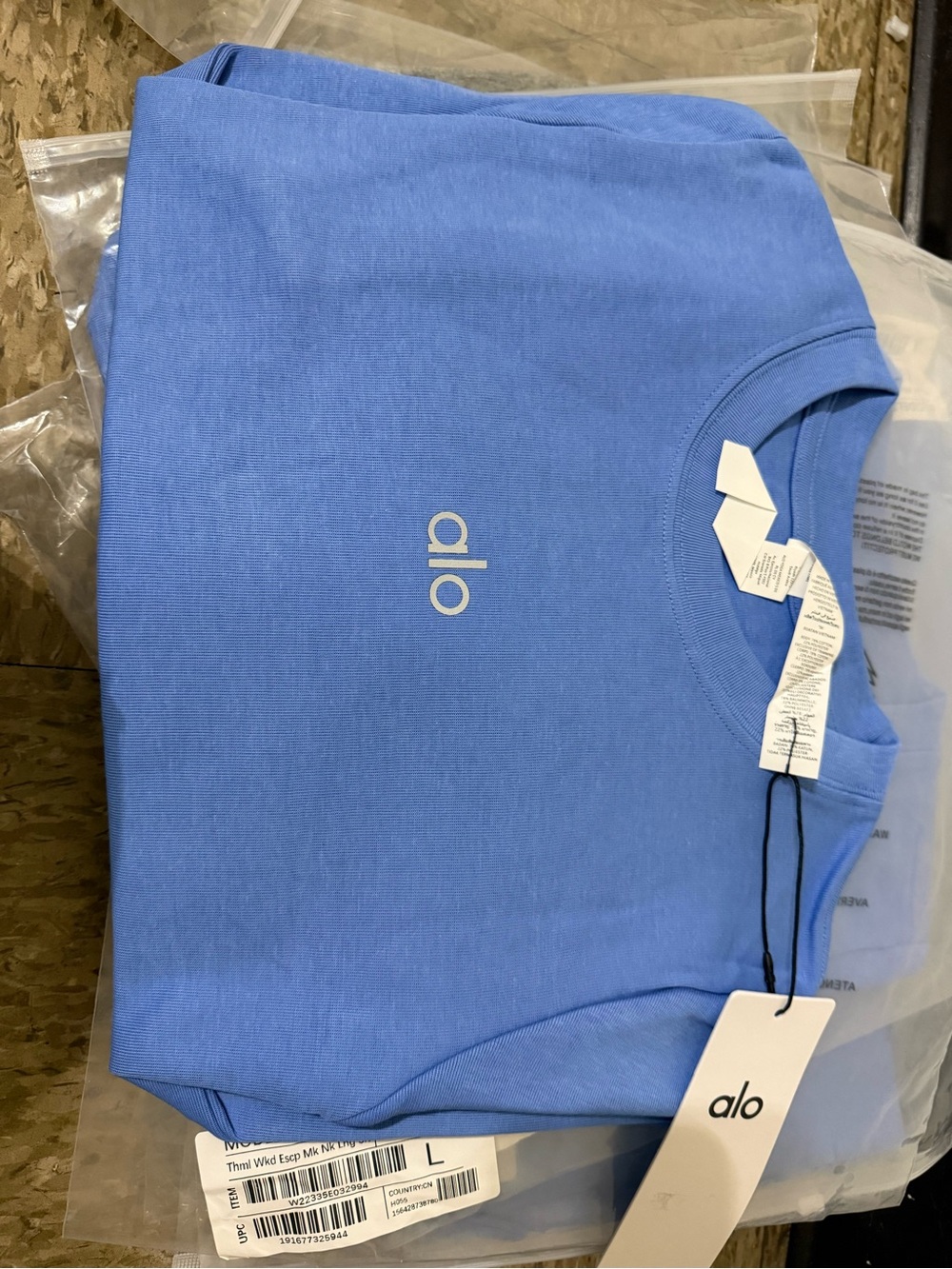 ALO Yoga Women's Short Sleeve Tee in Cornflower Blue